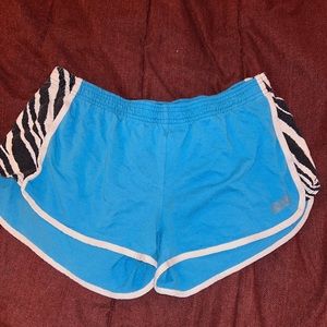 Blue with zebra print SOFFE shorts.